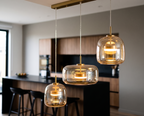Suspension Ambra en verre à trois points lumineux échelonnés